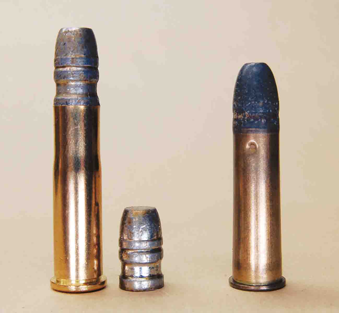 A new, unfired Starline .32-20 case would fit in the .310 chamber once the rim was thinned. The case was loaded with a pistol bullet. The bullet still didn’t touch the throat (left). A factory .310 cartridge is shown at right.